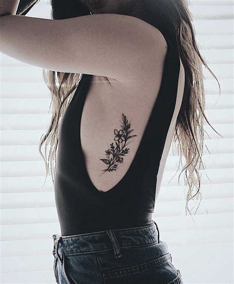 rib female tattoos